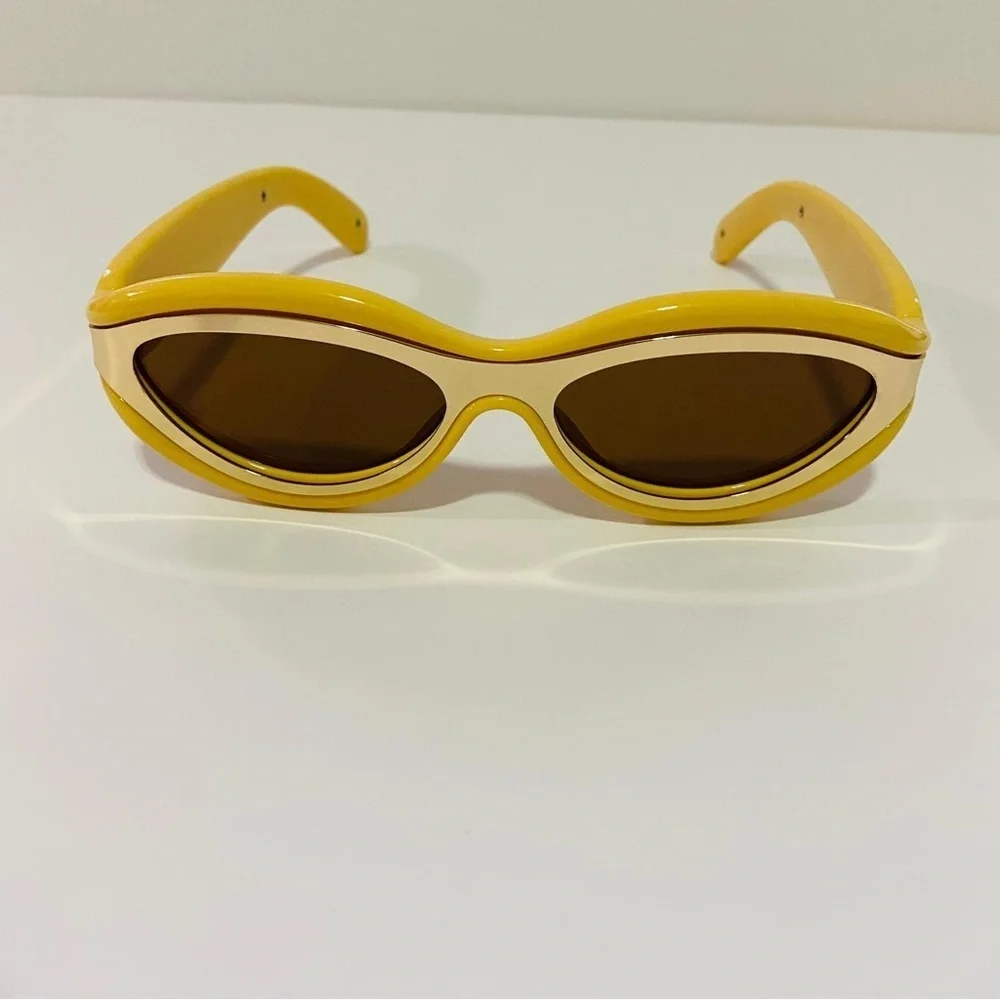 Luxury futuristic cat eye oval mustard pastel yellow steampunk sunglasses
